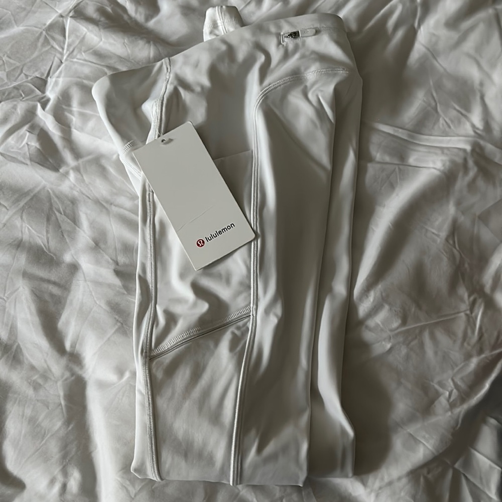 Lululemon women’s Speed Up Tight 28”, size 2, color WHT